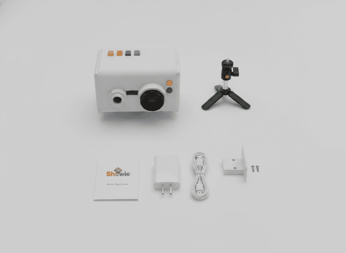 What's in the box: Showie projector, wall mount, power adapter, and quick start guide